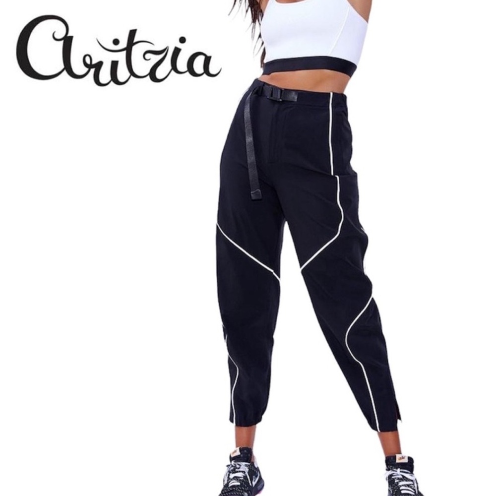 TNA Track Pants white piping zipper ankle